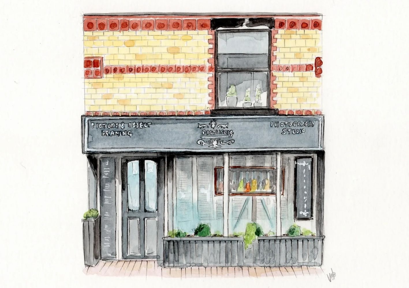 Picturesq photography and framing- shop front expertly drawn by Victoria Wood. 