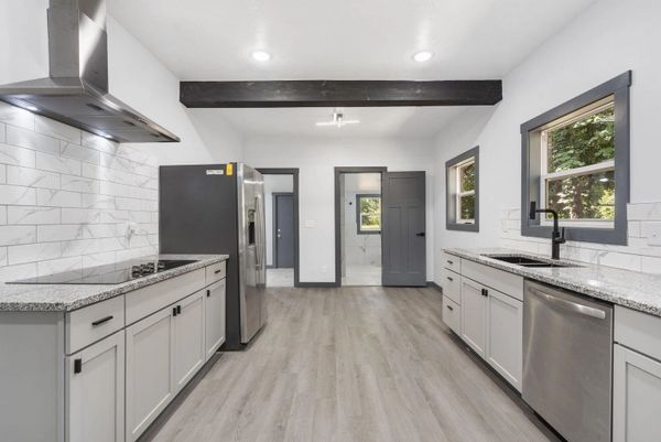 Stunning kitchen remodel by Right Choice Development with custom cabinetry and modern finishes