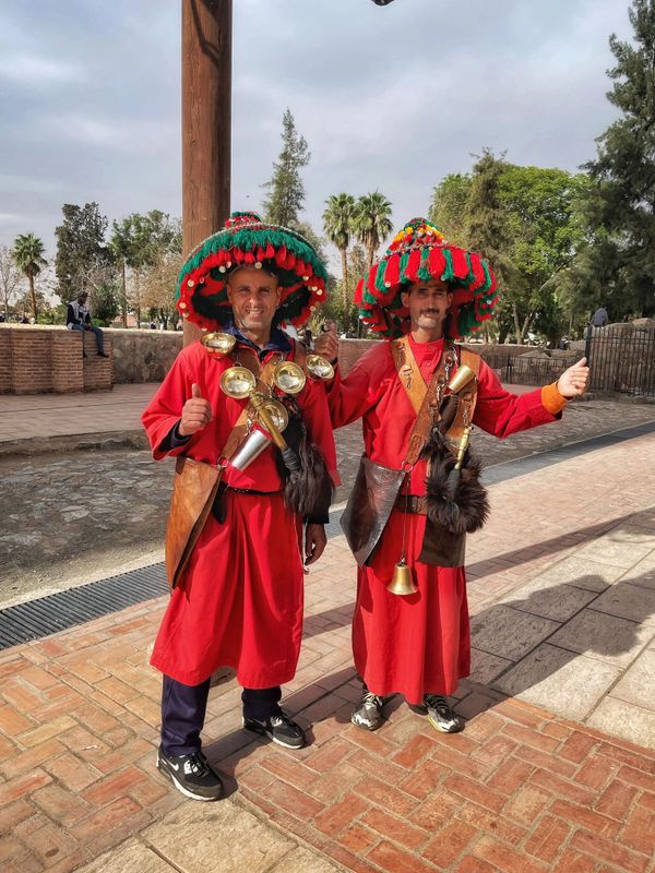 Marrakesh man selling water in traditional outfit