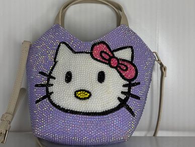 Custom Hello Kitty Design Painted on and then custom Rhinestones on top to match the vibe!