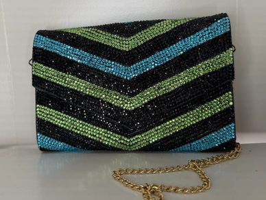 Stunning black, blue, and green chevron style purse with neon green inside!