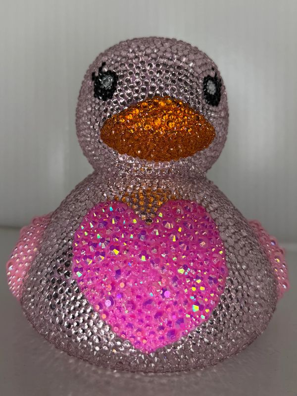 Beautifully customized pink rhinestone and pink pearl duck!