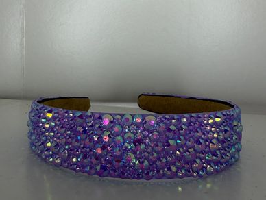 Beautifully customized solid purple rhinestone headband!