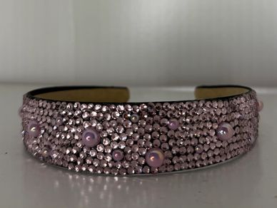 Beautifully customized headband with pink rhinestones and pink pearls!