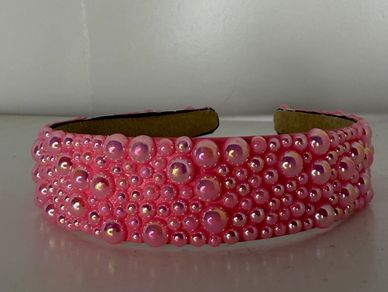 Beautifully customized solid pink pearl headband!