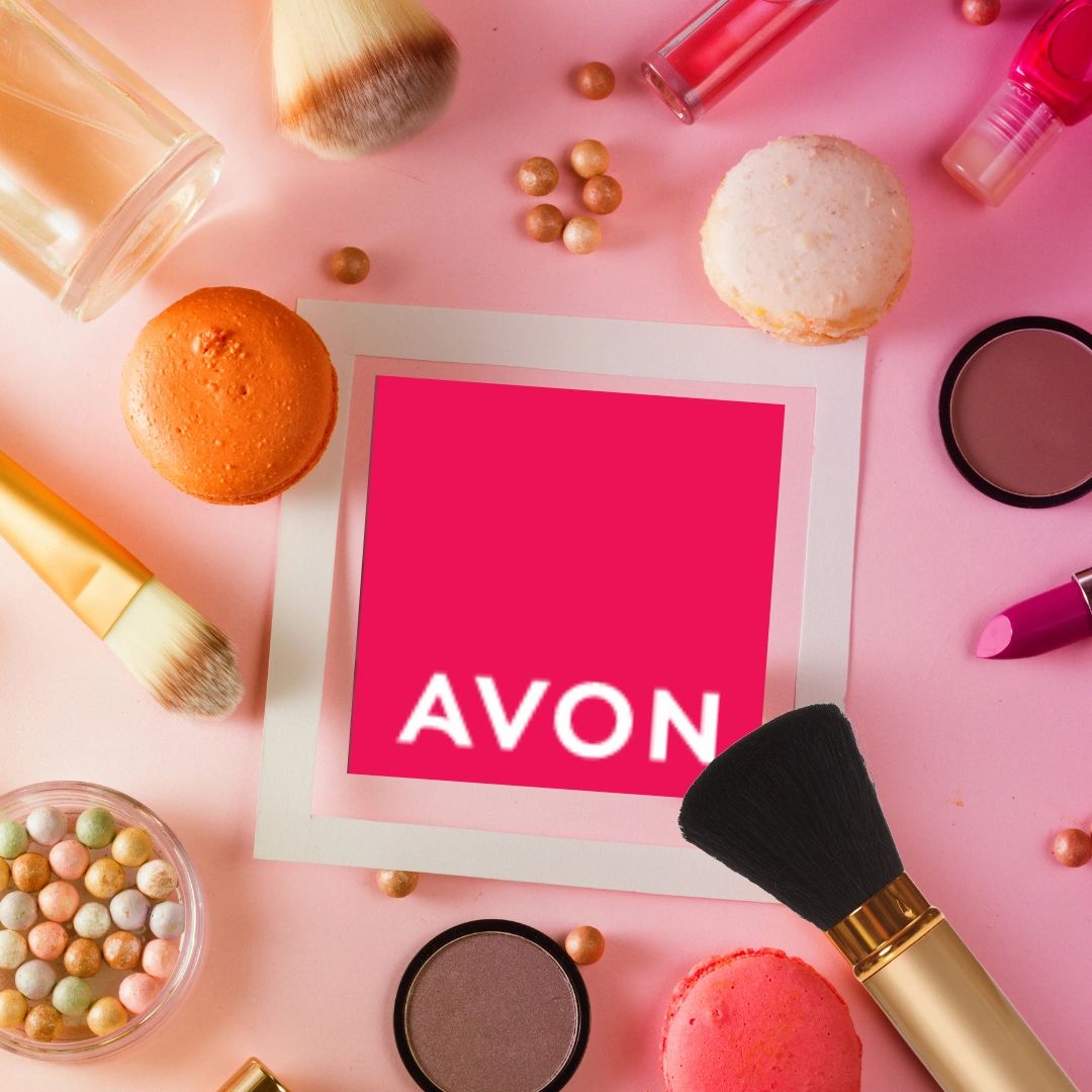 Picture showing lots of different Makeup products with brushes and the Avon Logo
