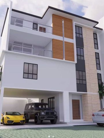 Modern three-story house with a garage and luxury cars.