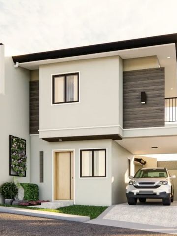 Modern two-story house with a car parked in the driveway.