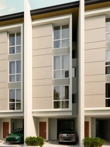 Modern three-story townhouses with garage parking and large windows.