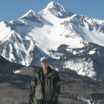 Asbestos, Lead, and Mold inspector snowshoeing to work near the SanJuan Mtns in Southwest Colorado.