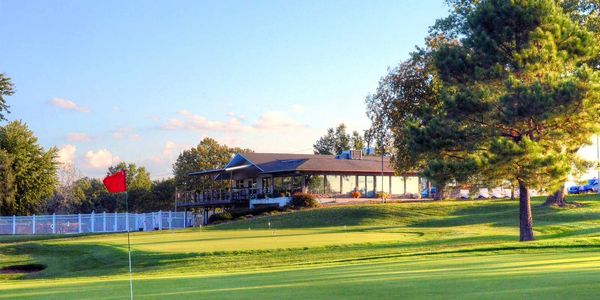Sandstone Country Club Proshop overlooking the 9th green and practice green.