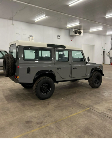 1991 Gray Land Rover Defender 110 side view