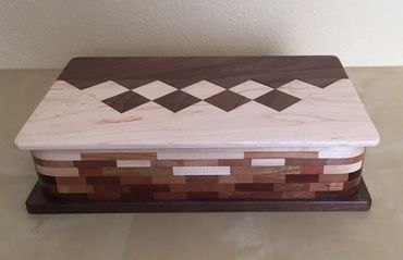 Box made from small pieces of maple, cherry and black walnut.