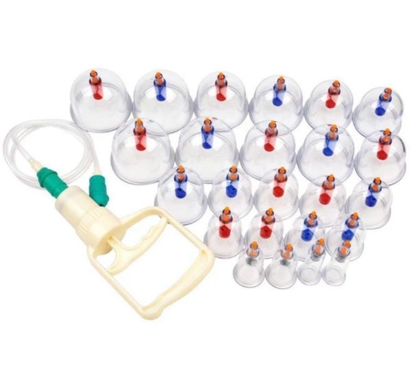 Set of transparent plastic vacuum therapy cups with pump.