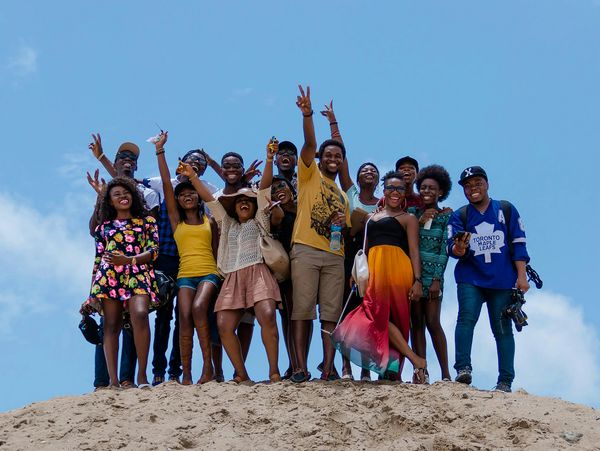 Group of friends smiling and enjoying each other 