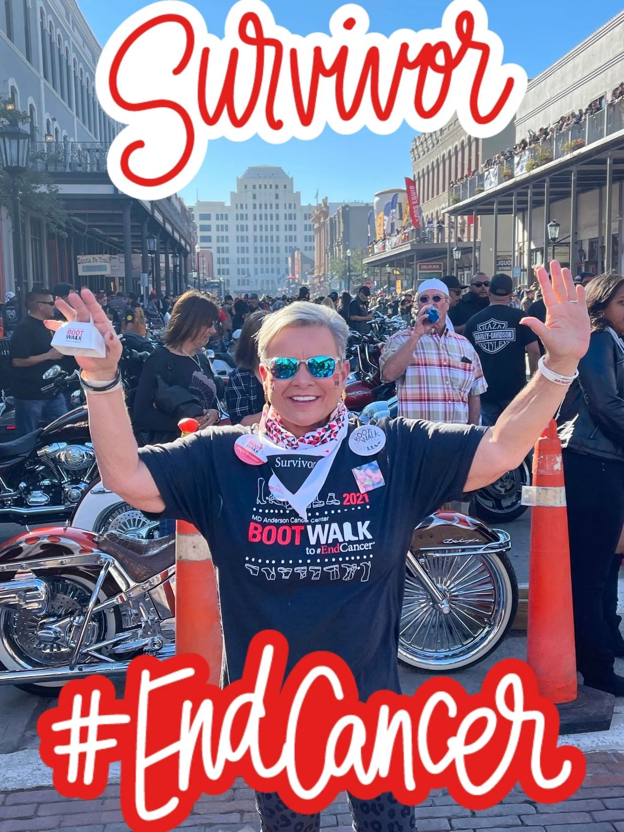 Smiling survivor celebrates at a cancer awareness Boot Walk event.