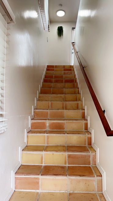 Stairs to second floor unit