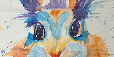 Colorful watercolor painting of a rabbit's face with big eyes and expressive features.