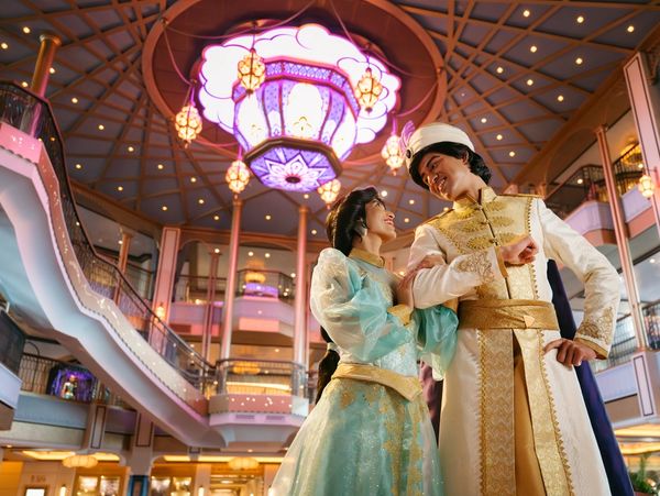 Couple dressed as Disney's Aladdin and Jasmine.