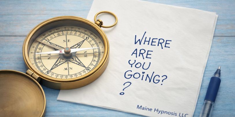 Compass with note saying 'Where are you going?'