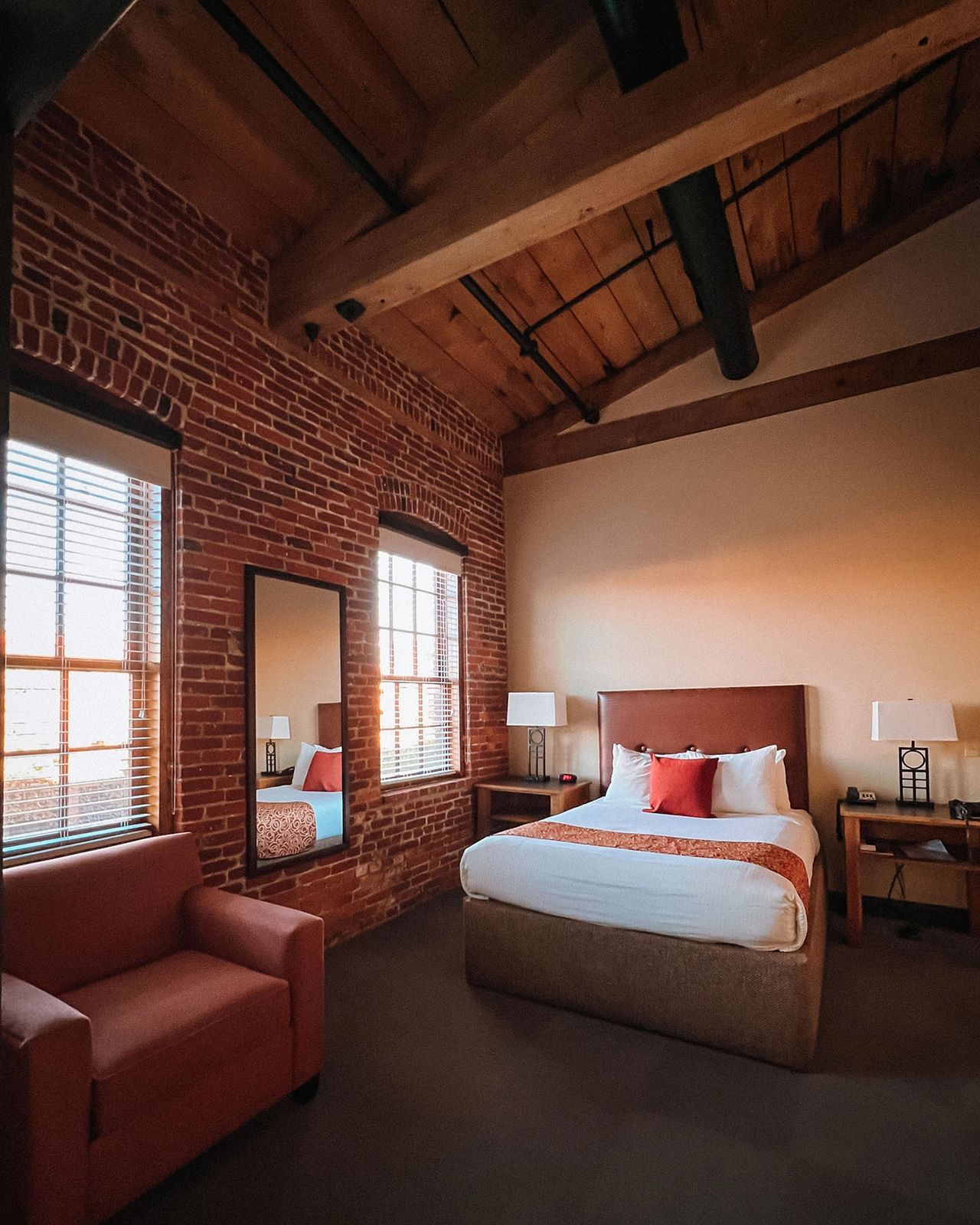 Experience a unique stay at Cork Factory Hotel in Lancaster, PA, where historic industrial design meets modern comfort. This boutique hotel features exposed brick walls, wood-beamed ceilings, and cozy yet stylish decor, offering a perfect blend of heritage and hospitality for your Pennsylvania getaway.