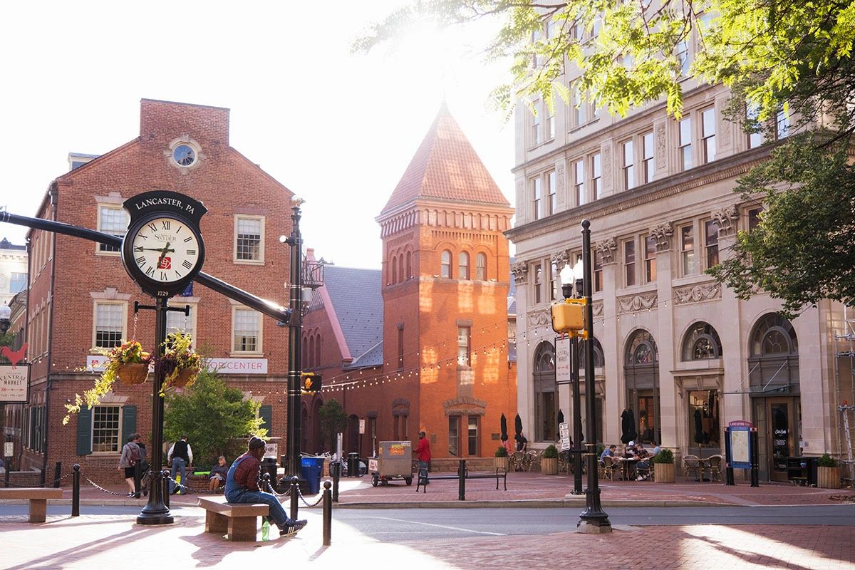Experience the beauty of Downtown Lancaster, Pennsylvania, where historic architecture meets a vibrant cityscape. This stunning shot captures Penn Square, the heart of the city, featuring the iconic Lancaster clock, charming brick buildings, and lively outdoor cafés. Whether you're exploring the Central Market, enjoying local restaurants, or soaking in the rich history, Lancaster offers the perfect blend of past and present. Plan your visit to one of Pennsylvania’s most picturesque small cities!
