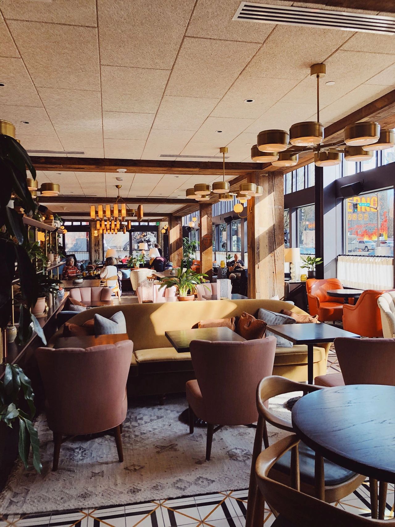 The stylish lobby of The Hoxton Portland, filled with warm lighting, plush seating, and mid-century modern decor that captures the city’s creative spirit. Located in Portland’s Pearl District, The Hoxton blends sophistication with a relaxed, welcoming atmosphere, making it one of the best boutique hotels in Portland for design lovers and travelers seeking local flair. 