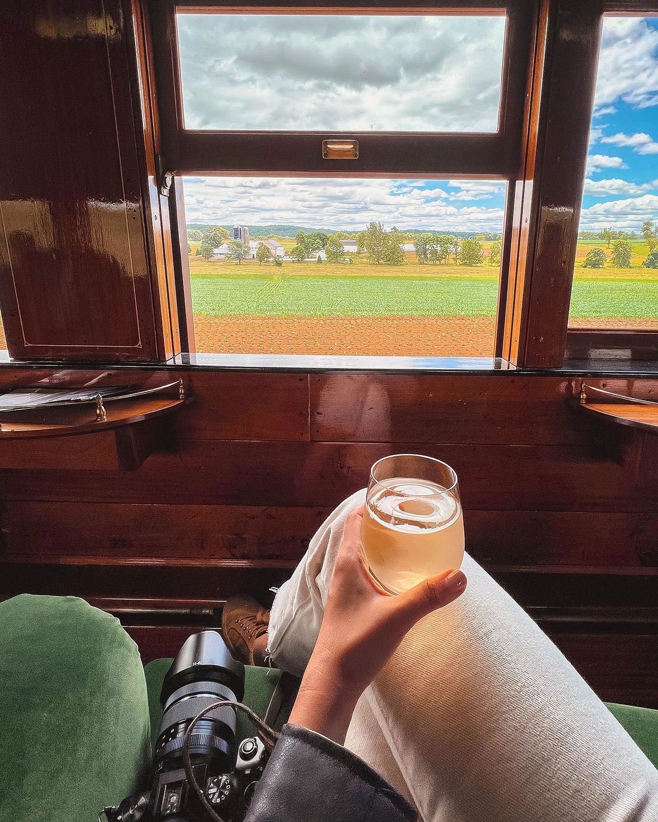 Sit back, sip, and take in the breathtaking views of Lancaster County’s rolling farmland aboard the Strasburg Rail Road. This historic steam train ride in Pennsylvania offers a unique way to experience the region, with open-window views of Amish farms, picturesque countryside, and the relaxing ambiance of a vintage railcar. Whether you’re capturing the moment with your camera or simply enjoying the ride, this historic train journey is one of the best ways to explore Lancaster’s scenic beauty!