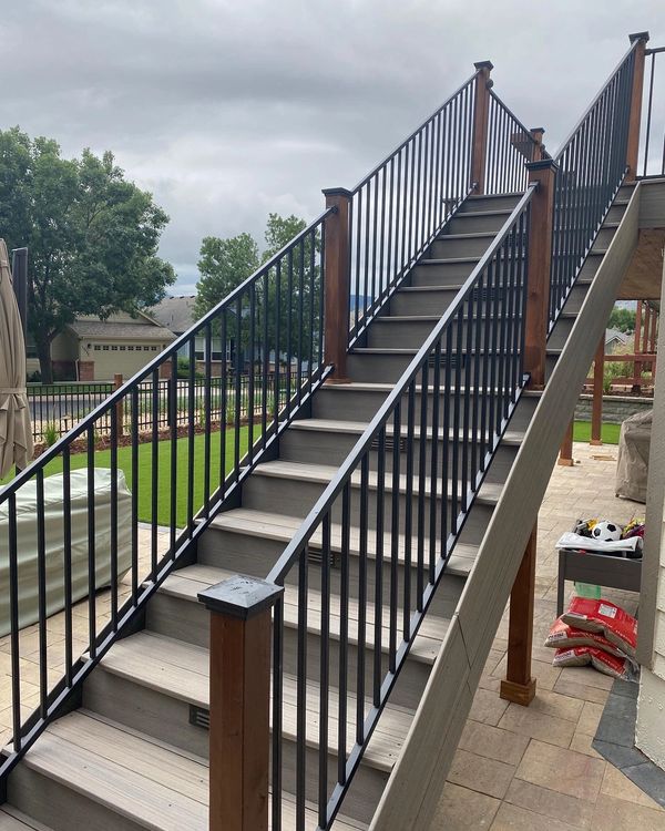Two story deck staircase, paver patio, artificial turf, retaining walls 