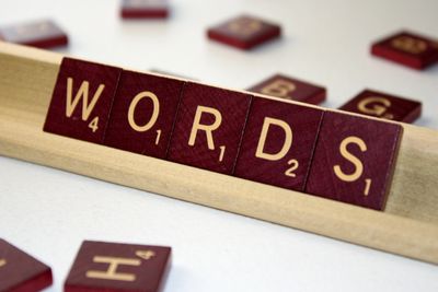 Scrabble tiles that spell "word".