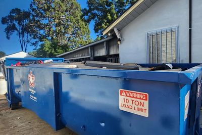 Trash and debris loaded for hauling by Rogue Junk Removal in Sacramento