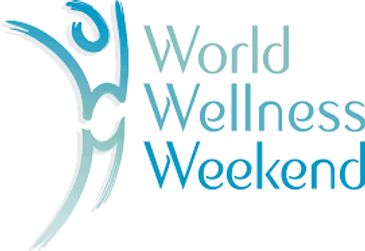 Logo for World Wellness Weekend with stylized figure.