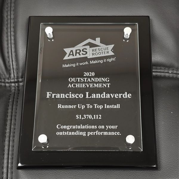 Premier Piano Finish Floating Glass Plaques have felt back for added elegance.  Black and Rosewood