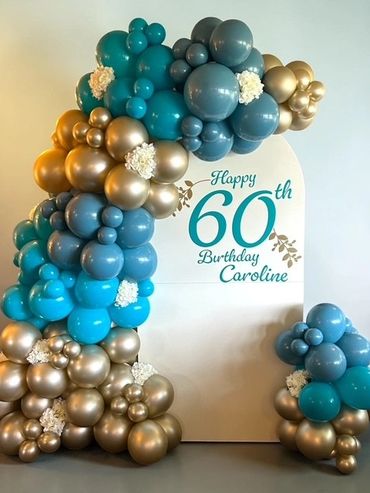 Elegant balloon arch for Caroline's 60th birthday celebration.