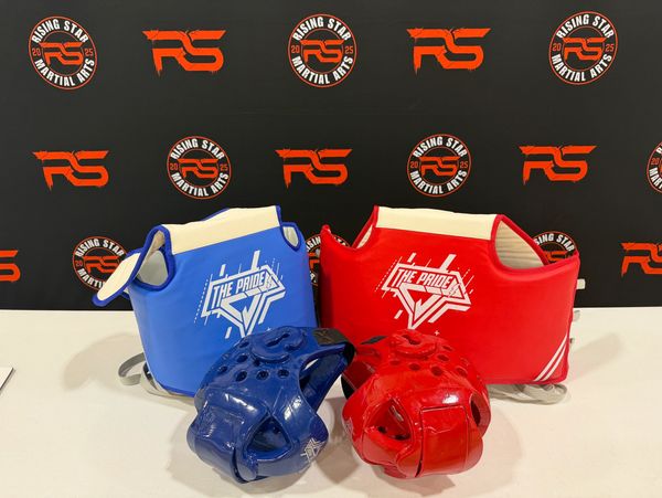 Blue and red martial arts protective gear on a table.