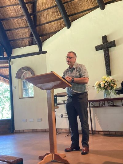 A missionary speaking during a bible teaching session at church.