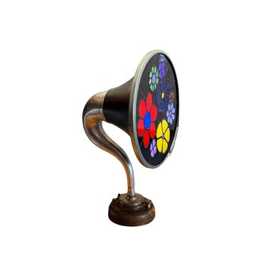Retro gramophone horn with colorful floral design.