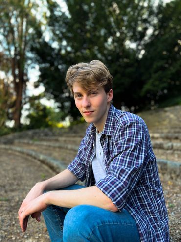 Jamie Moreland sat on steps outside