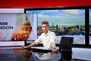 Jamie Moreland sat behind the desk of the BBC London TV studio