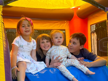 The Schaffer Kids enjoying their Bounce House