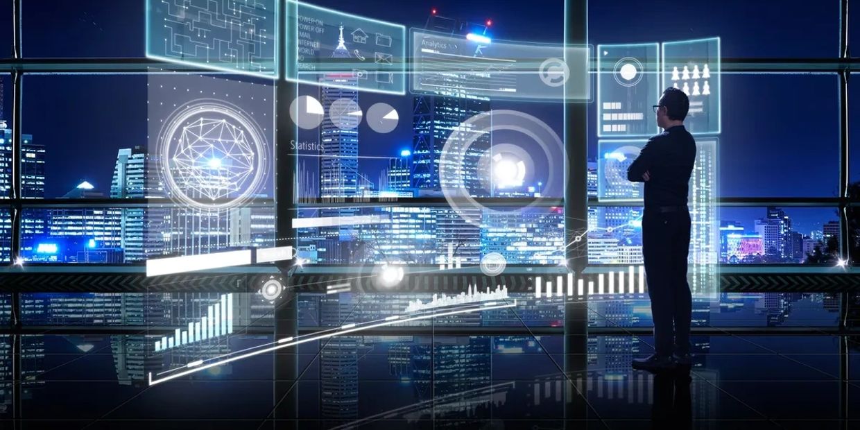 Man analyzing futuristic digital data displays in a high-tech office at night.