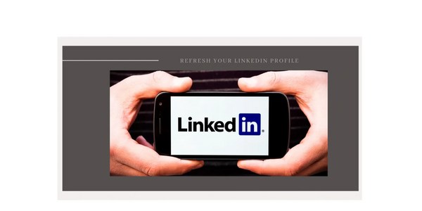 Hands holding phone displaying LinkedIn logo with text to refresh profile.