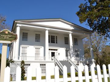 Grand porch and colums at the circa 1830 Orange Hall.