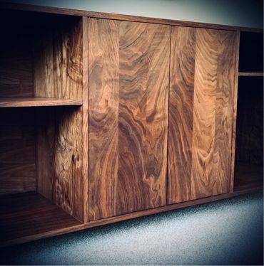 Handmade entertainment center. media console. custom cabinetry. solid wood cabinet, custom cabinet.