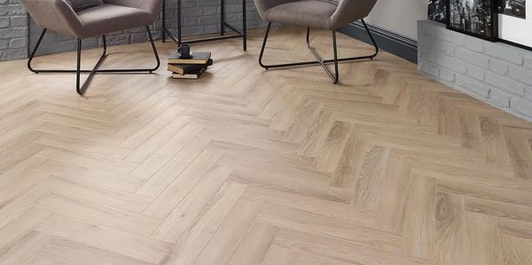 12mm Laminate Herringbone flooring colour Malmo 100% waterproof makes any room look stunning