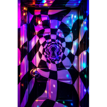 Door with psychedelic lights and keyhole design.