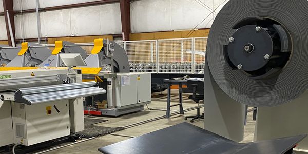 Industrial machines and equipment inside a factory setting.