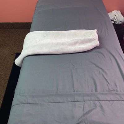 Expect a nice spa bed, with a robe for your next spa party at beauty beast studio.