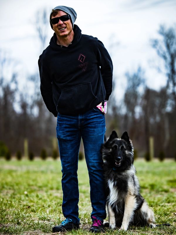 Dog trainer with Belgian shepherd
