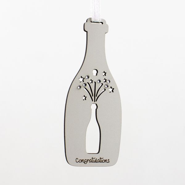 A photo featuring a champagne bottle design hanger